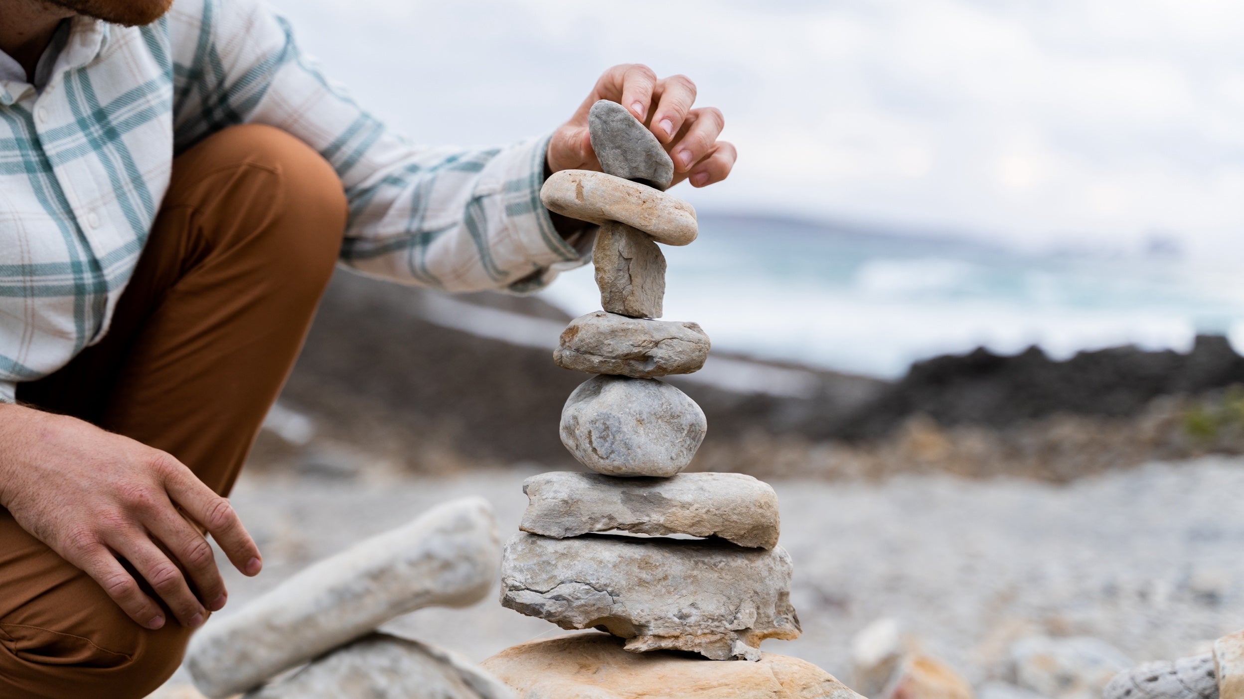 Man balancing rocks